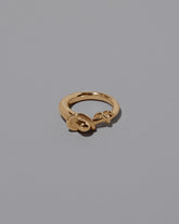 CRZM 22k Gold Terrane Ring on light color background.