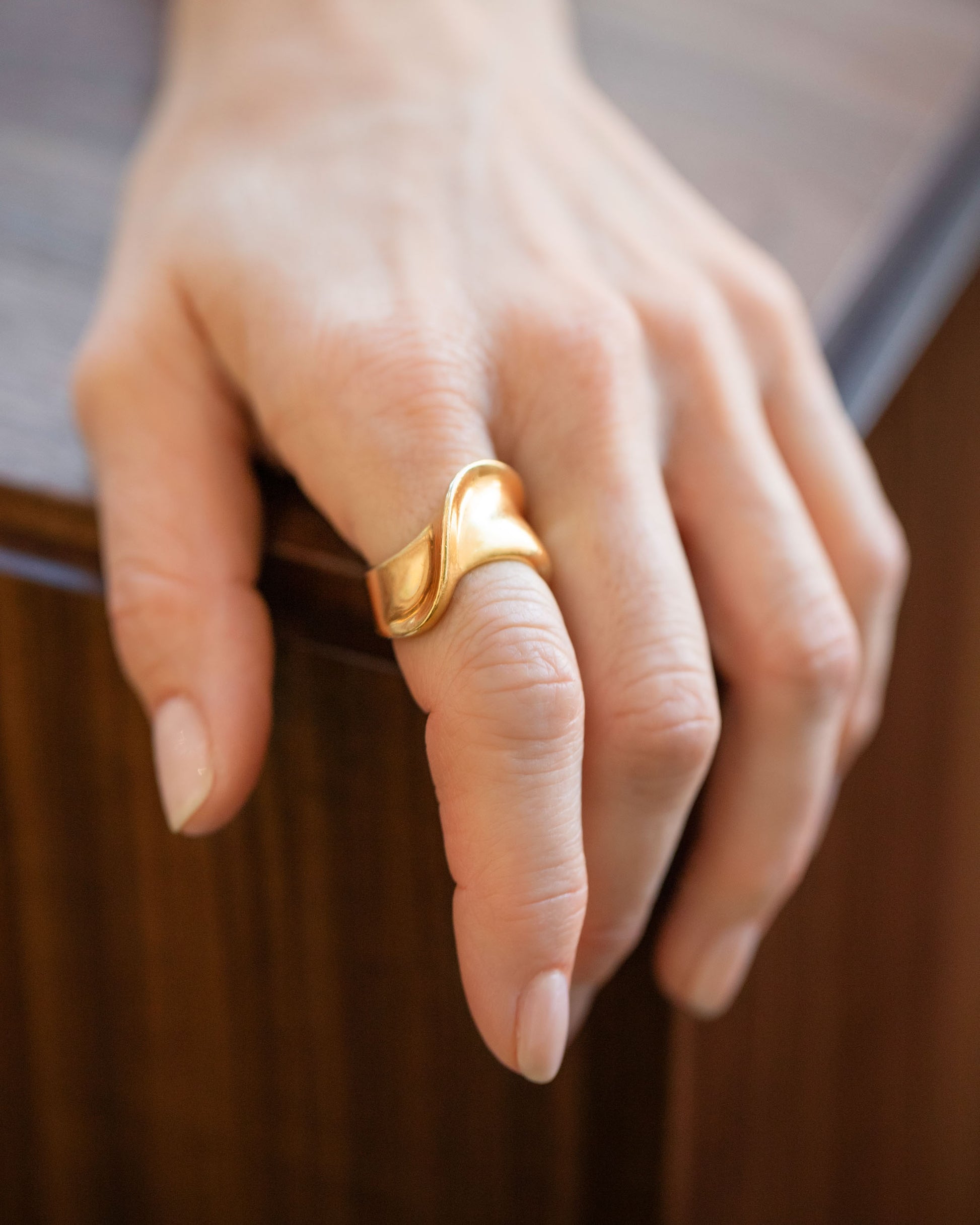 Vintage Gold Ribbon Ring on model.