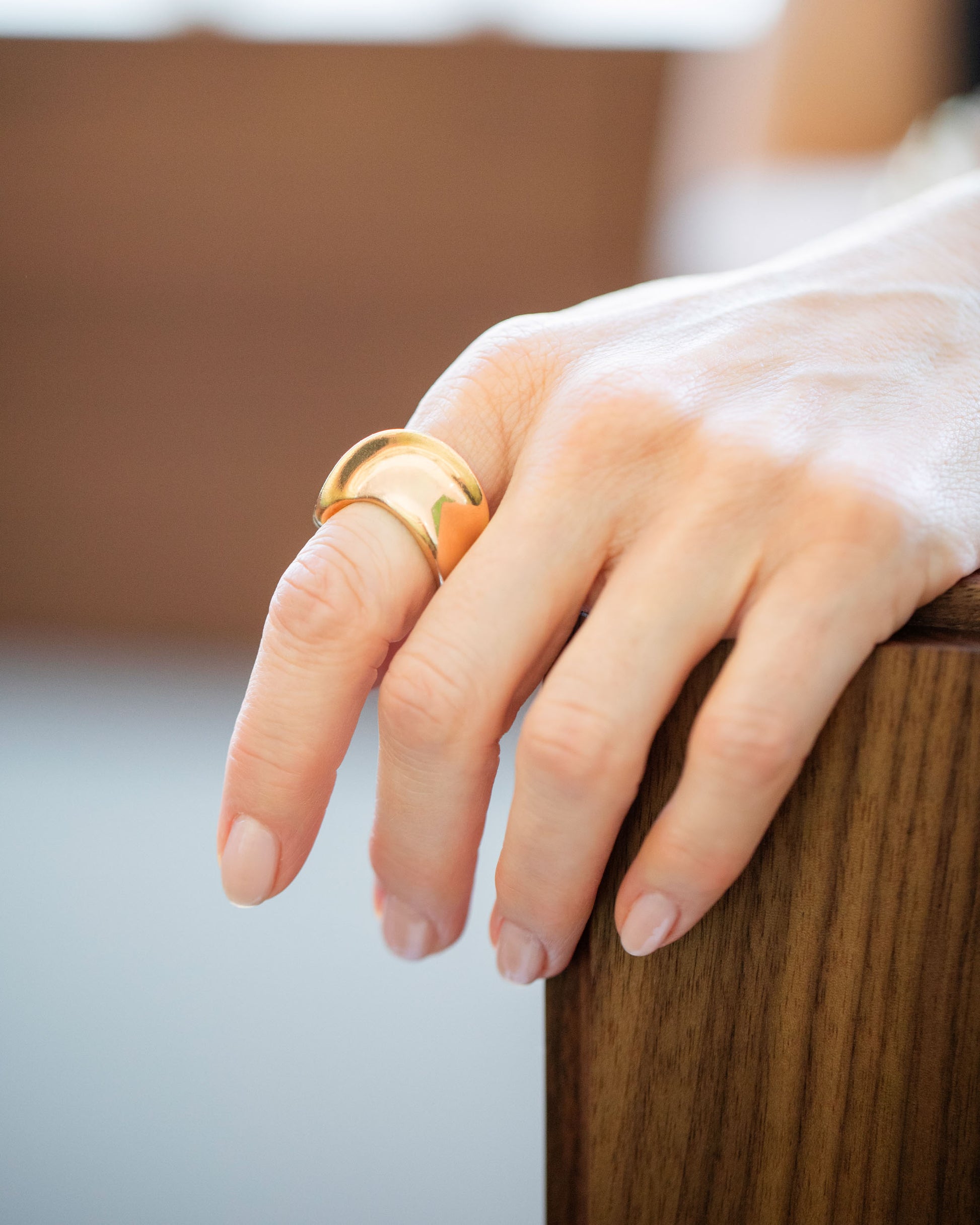 Vintage Gold Ribbon Ring on model.