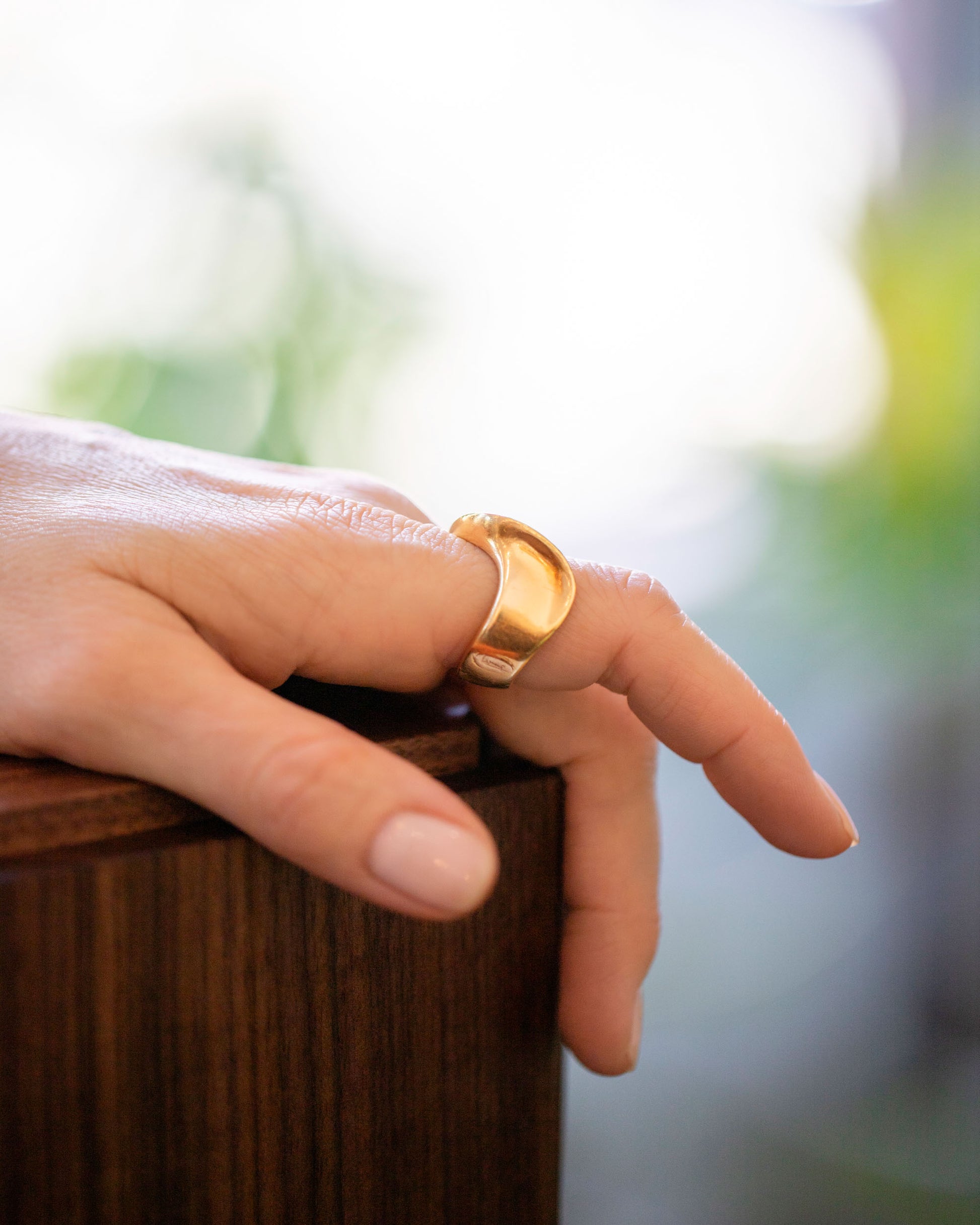 Vintage Gold Ribbon Ring on model.