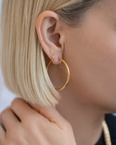 Vintage Blvgari Hoop Earrings on model.