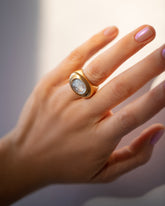 product_details::Vintage Moonstone Demeter Intaglio Ring on model.