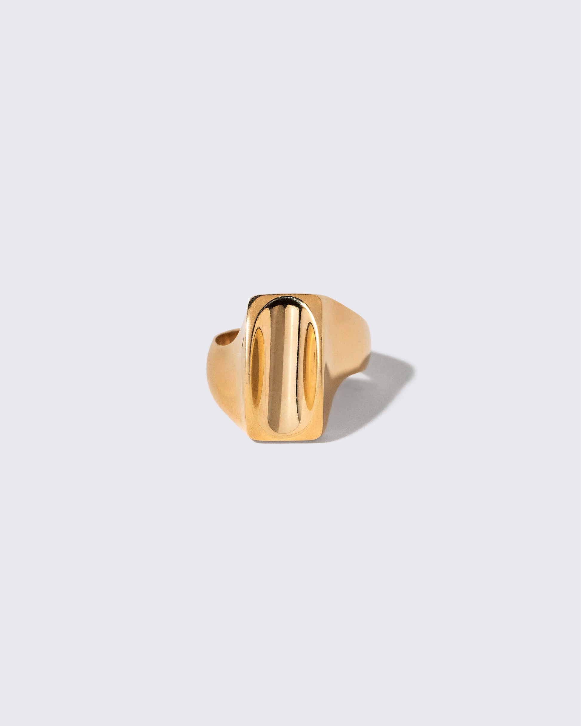 Vintage Gold Saddle Ring on light color background.