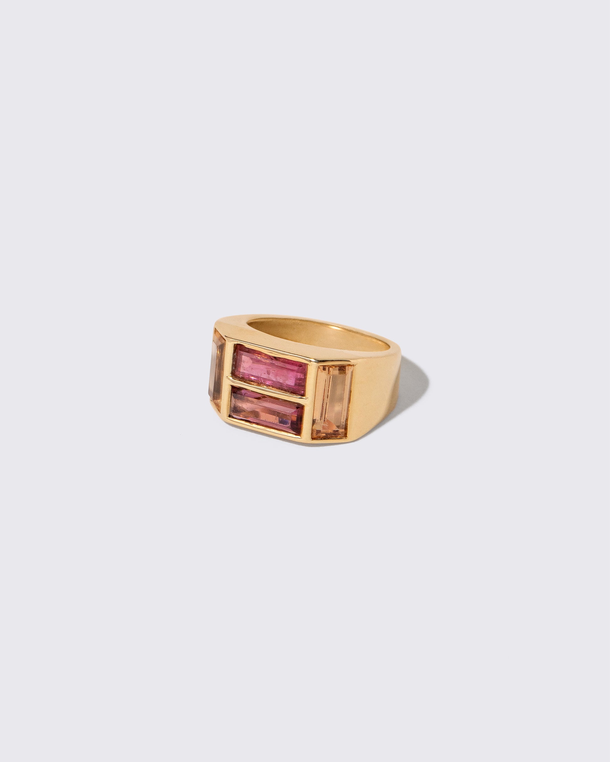 View from the side of the Vintage Tiffany & Co. Paloma Picasso Studio Ring on light color background.