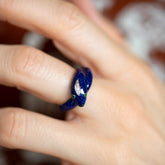 product_details::Vintage Cartier Enamel Snake Ring on model.