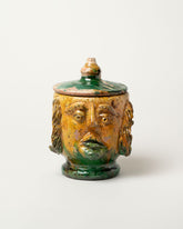 Apotropaia Lidded Head Jar One on light color background.