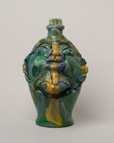 Apotropaia Medium Head Jug One on light color background.
