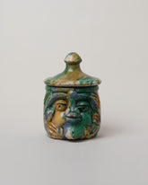Apotropaia Small Head Jar on light color background.