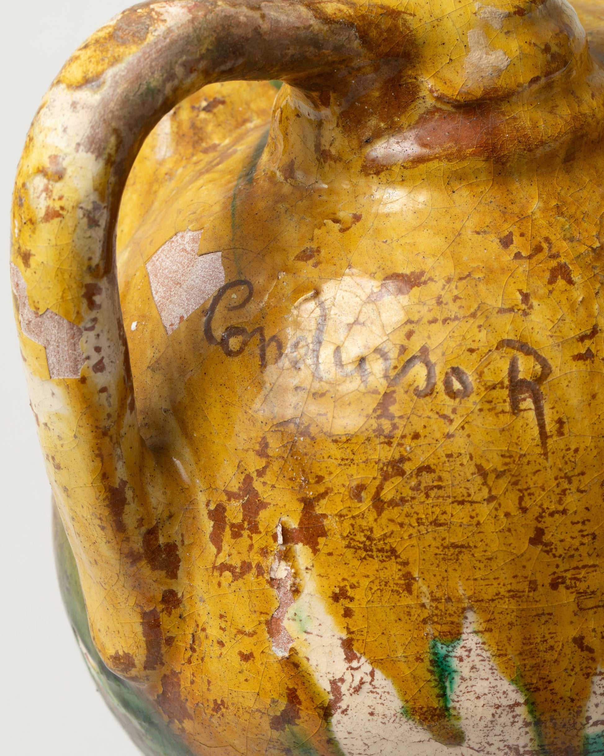 Closeup details of the Apotropaia Large Head Jug One on light color background.