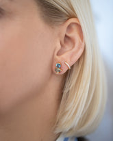 Ara Earrings on model.