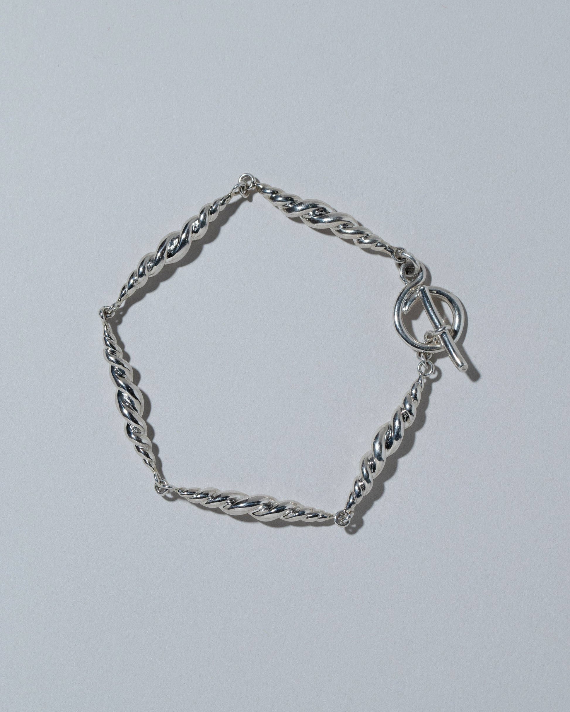 CRZM Samples & Imperfects Sterling Silver Foothill Bracelet on light color background.