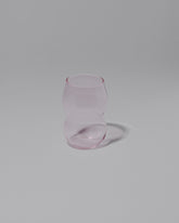 Ornamental by Lameice Pink Transparent Dreamlike Cup on light color background.