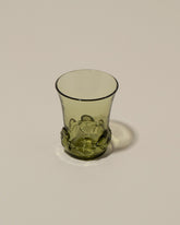 Closeup details of the Bollenglass Design Green Liquor Glass on light color background.