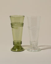 Bollenglass Design Green Small Spiral Tumbler and Clear Small Spiral Tumbler on light color background.