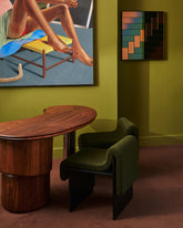 Styled image featuring the Bower Studios Lattice Mirror 3 and the Low-Back Melt Accent Chairs in the Mociun Showroom.