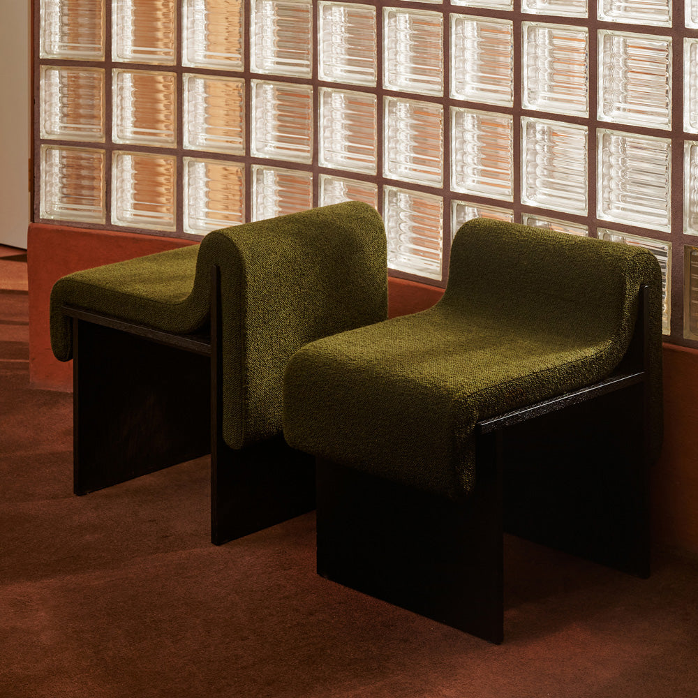 product_details::A pair of Bower Studios Low-Back Melt Accent Chairs in blackened oak upholstered with Maharam
Hearth in Downfield in front of accent wall. in front of accent wall.