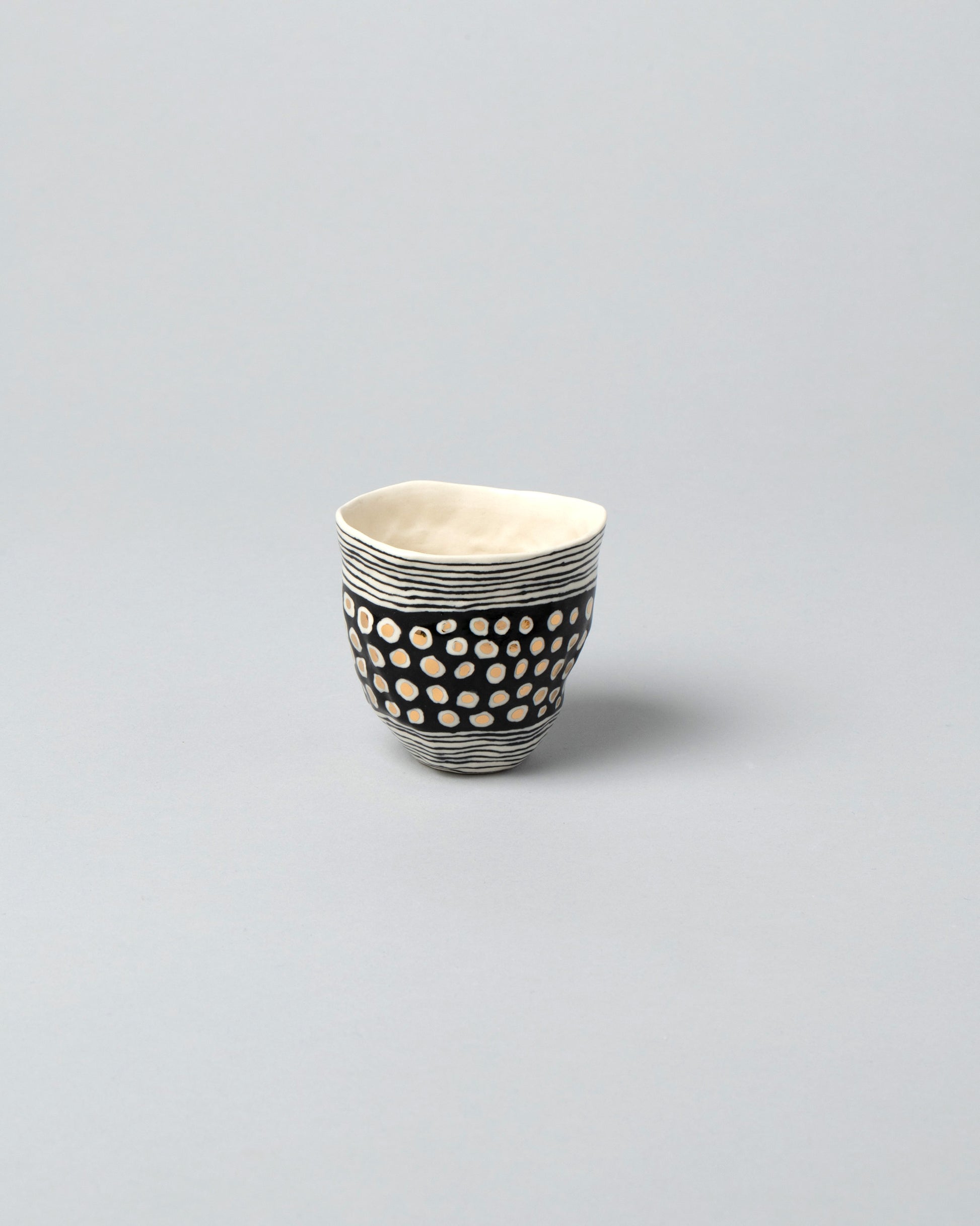 Suzanne Sullivan Three Gaia Tumbler on light color background.