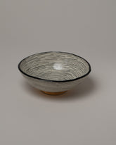 Suzanne Sullivan Footed Serving Bowl on light color background.