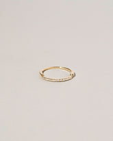 Gold Notched Band on light color background.