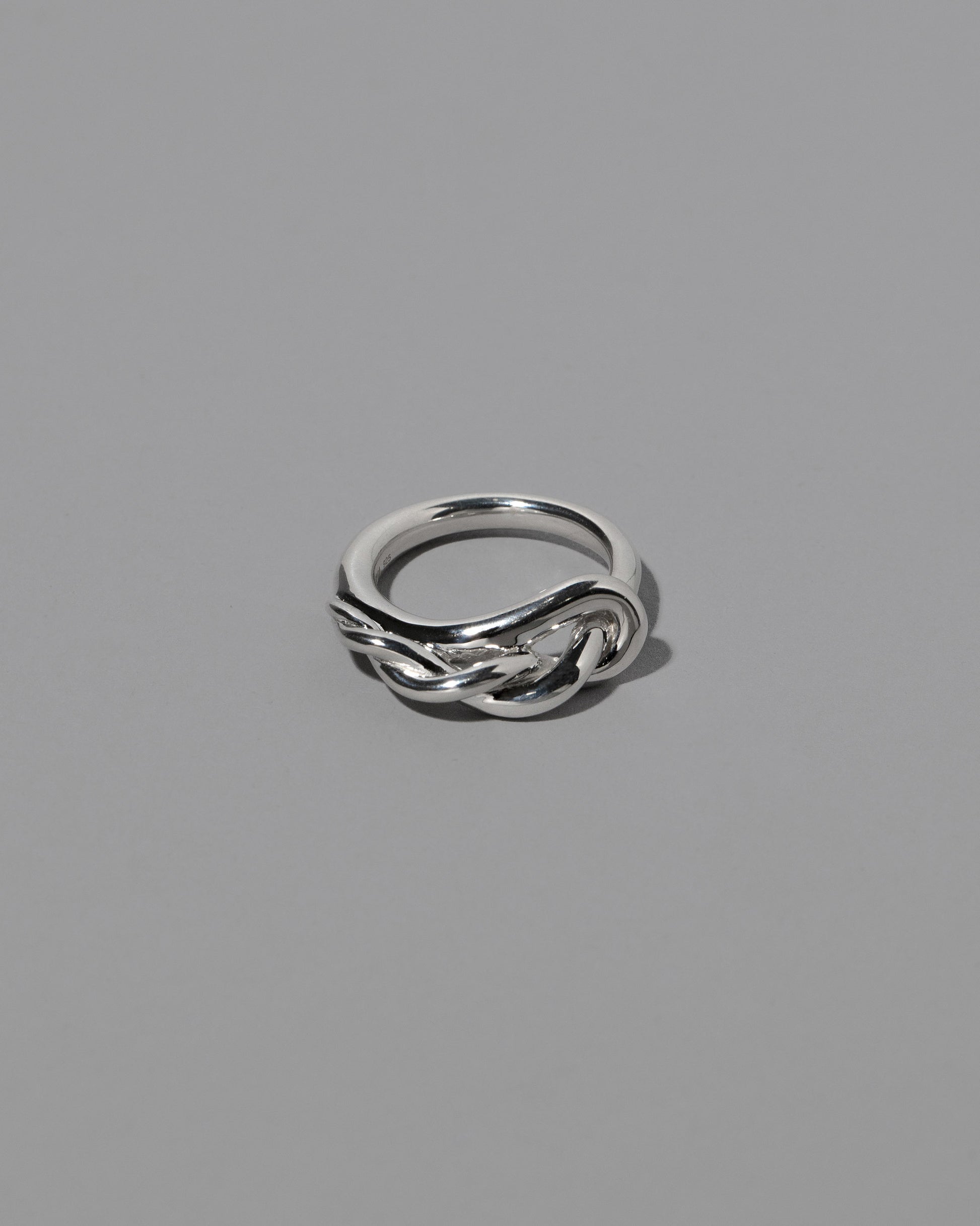 CRZM Sterling Silver Ophiolite Ring on light color background.