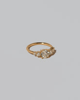 View from the side of the White Diamond Capella Ring on light color background.