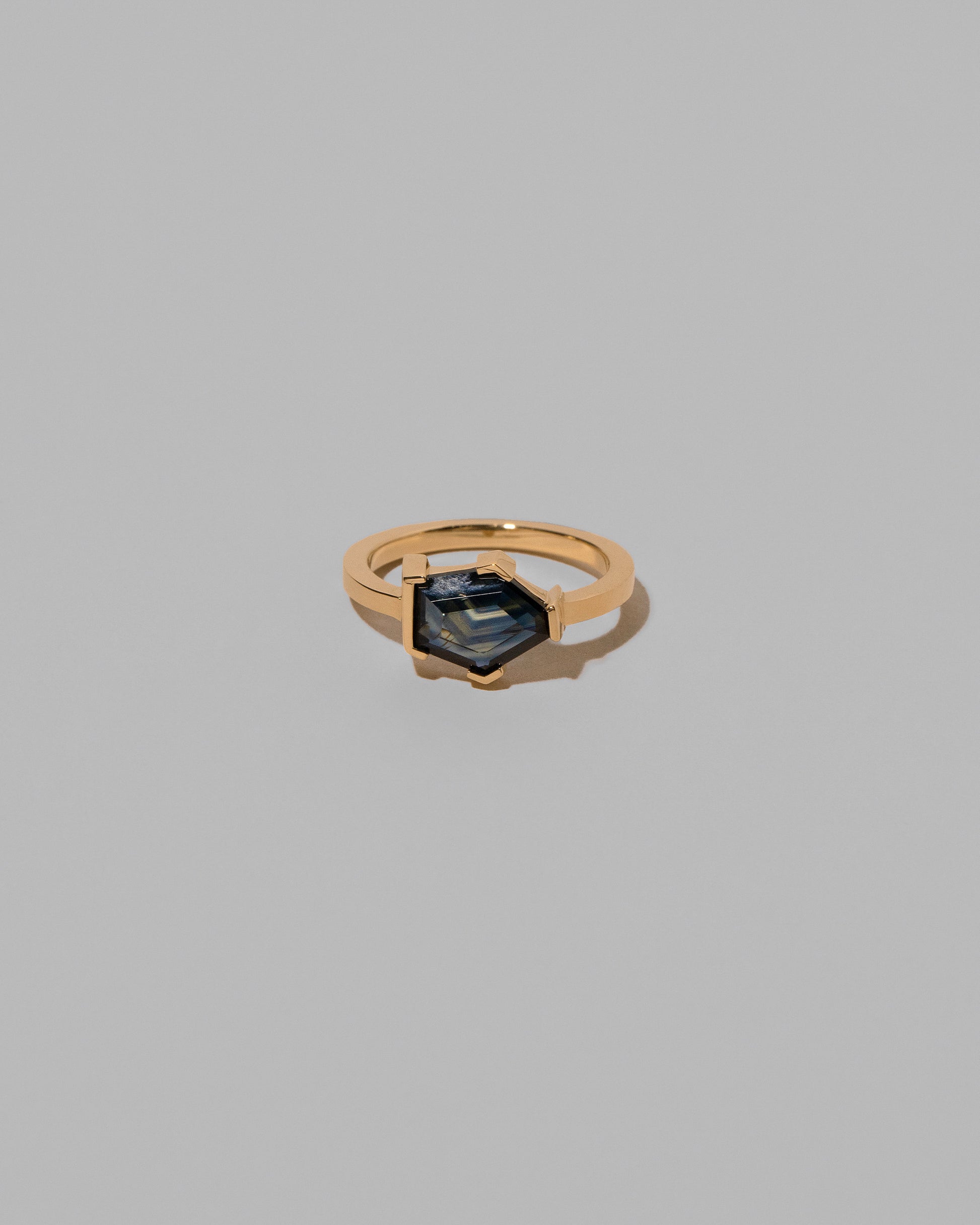 Caring Ring on light color background.