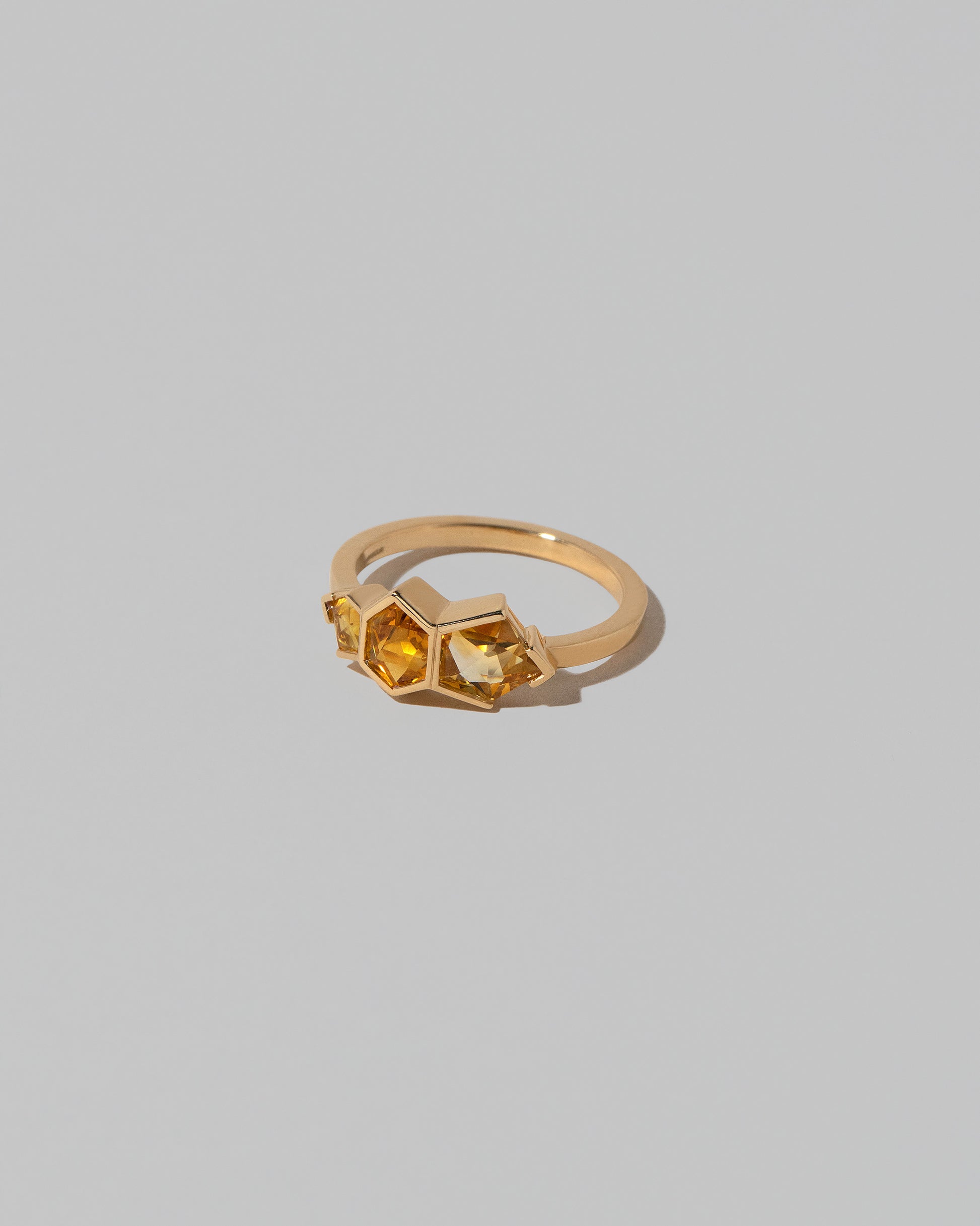 View from the side of the Cattleya Ring on light color background.