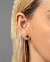 Blue Sapphire Fold Earrings on model.