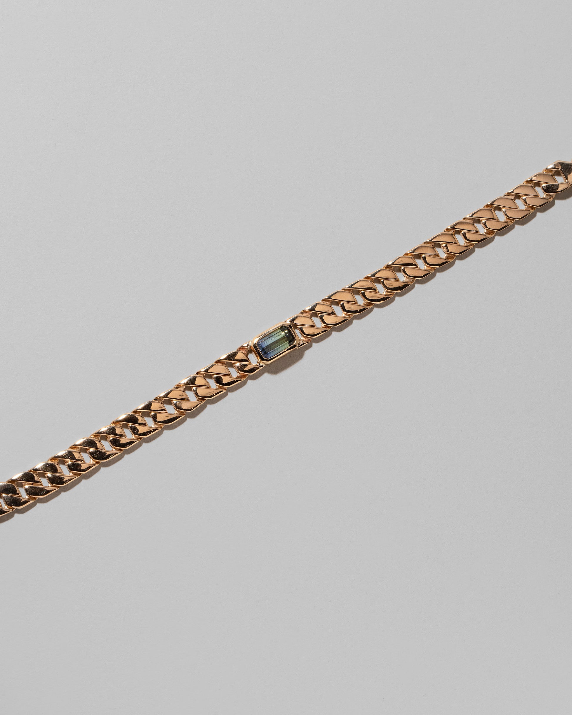 Closeup details of the Identity Chain Bicolor Tanzanite Bracelet 002 on light color background.