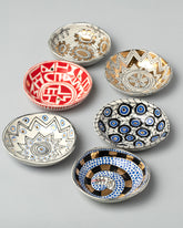Group of Suzanne Sullivan Mini Bowls on light color background.
