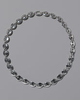 CRZM Sterling Silver Bedrock Necklace on light color background.