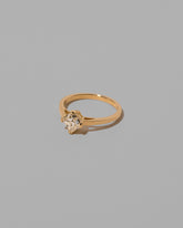 View from the side of the Delight Ring on light color background.