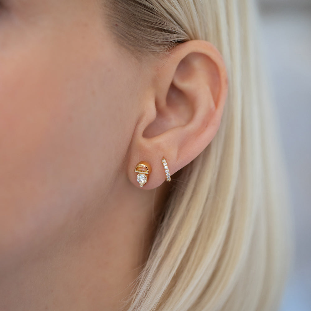 product_details::Delphinus Earrings on model.