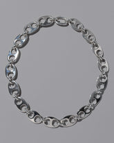 CRZM Sterling Silver Yuba Necklace on light color background.