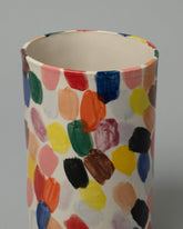 Closeup detail of the Amanda Lucia Côté Palette Vase on light color background.