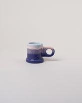 Echo Park Pottery by Peter Shire Pink & Purple Double Dip Espresso Mug on light color background.