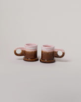 Echo Park Pottery by Peter Shire Pink & Brown Double Dip Espresso Mug Set on light color background.