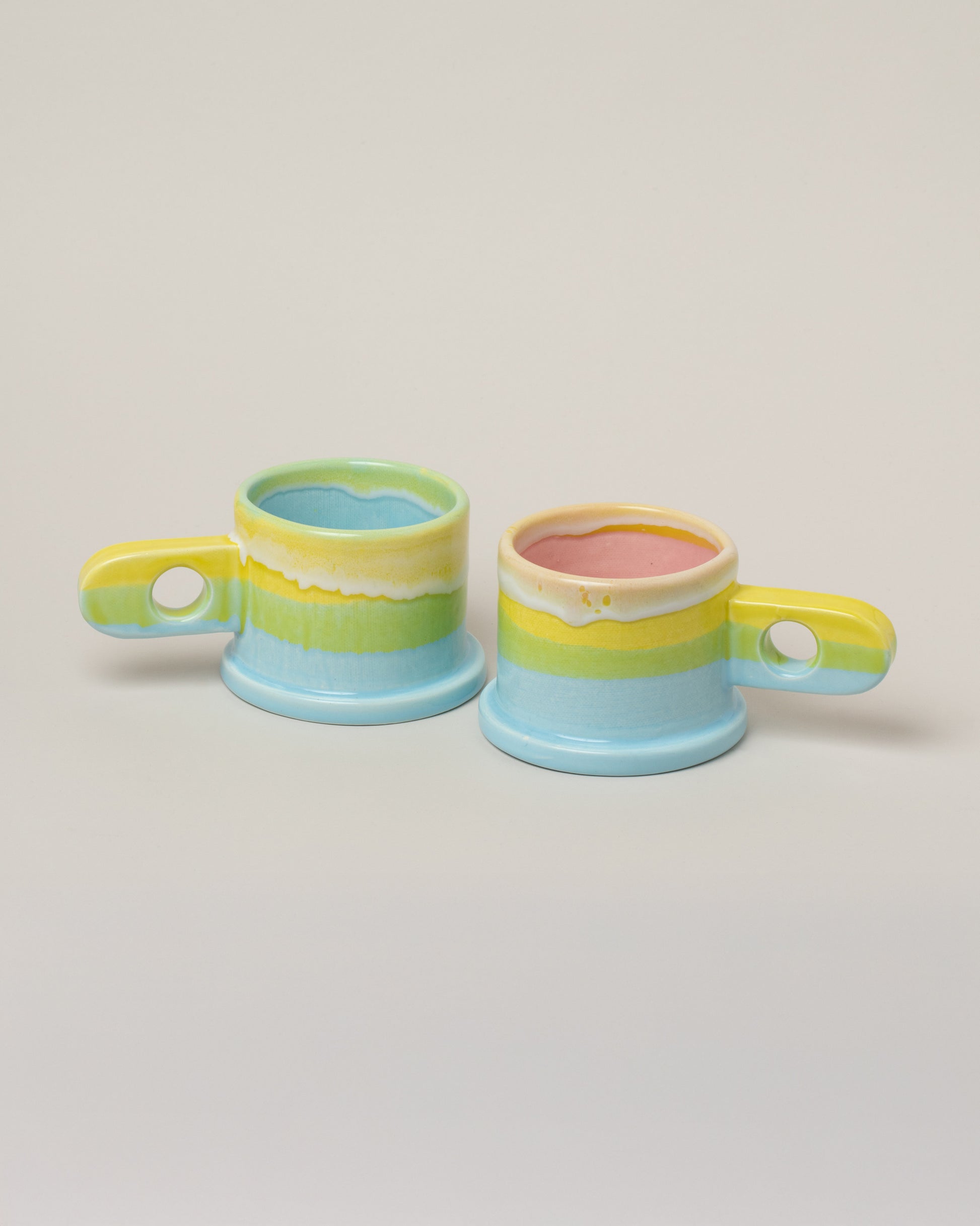 Echo Park Pottery by Peter Shire Lime & Baby Blue Double Dip Mug Set on light color background.