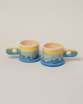 Echo Park Pottery by Peter Shire Yellow & Blue Double Dip Mug Set on light color background.