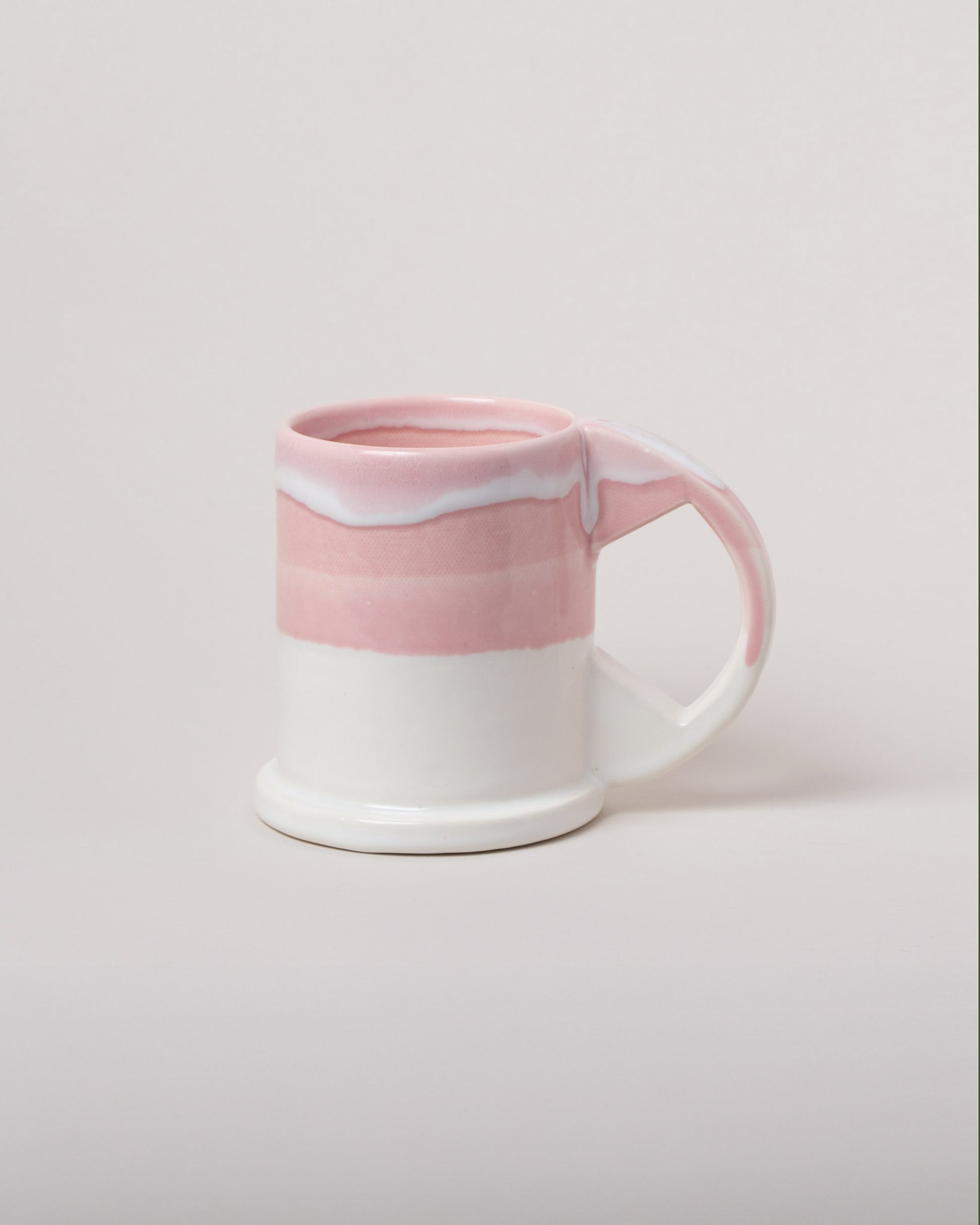 Echo Park Pottery by Peter Shire Pink & White Large Double Dip Mug on light color background.