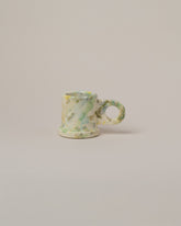 Echo Park Pottery by Peter Shire Lime Splatter Espresso Mug on light color background.