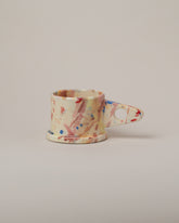 Echo Park Pottery by Peter Shire Rose & Blue Splatter Mug on light color background.