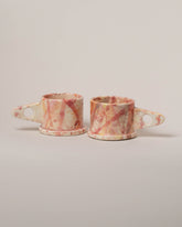 Echo Park Pottery by Peter Shire Rose Splatter Mug Set on light color background.