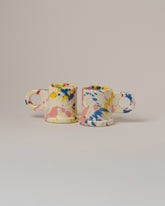 Echo Park Pottery by Peter Shire Blue & Yellow Splatter Espresso Mug Set on light color background.
