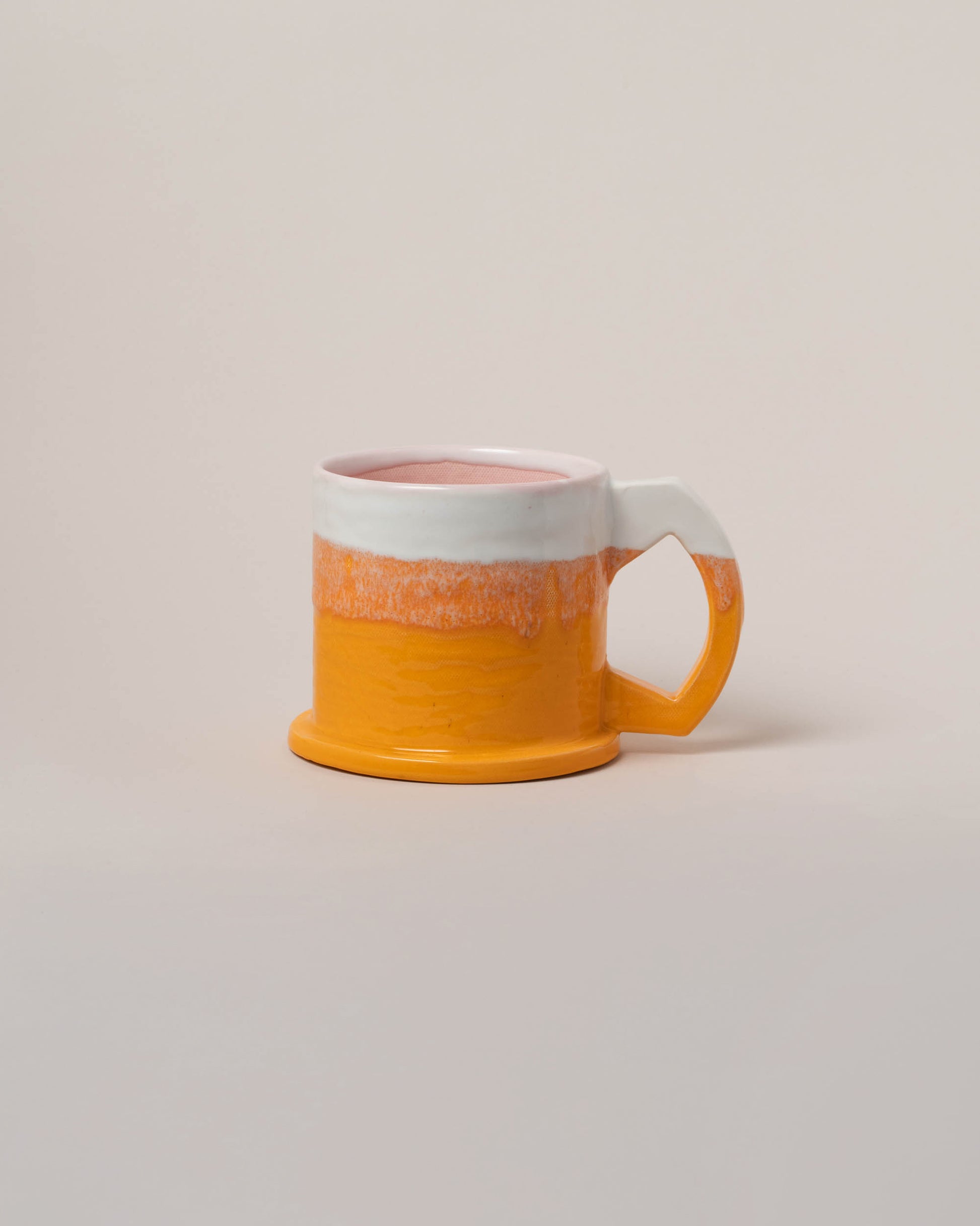 Echo Park Pottery by Peter Shire White & Orange XL Double Dip Mug on light color background.