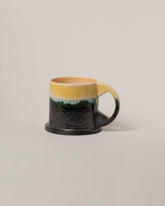Echo Park Pottery by Peter Shire Yellow and Blue & Black XL Double Dip Mug on light color background.