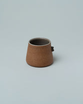 Emris Brick Clay Nub Cup on light color background.