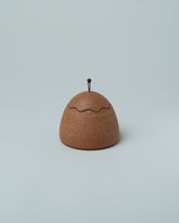 Emris Brick Clay Squiggle Jar on light color background.