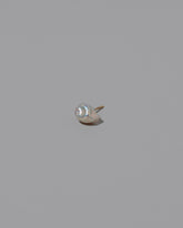 Natural Lagniappe Pearl Stud Earring Single on light color background.