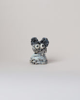 Eun-Ha Paek Apotropaia Mini Minnie on light color background.